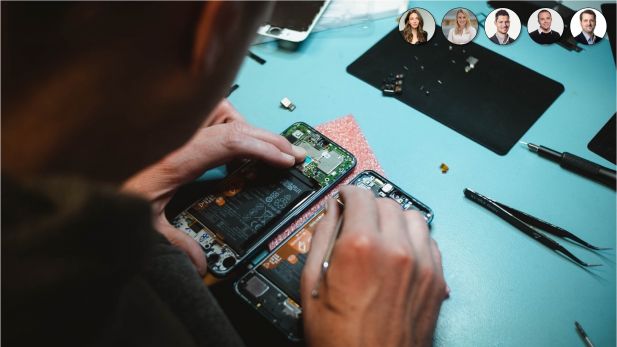 Man repairs smartphone